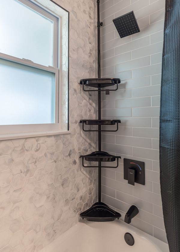 Guest bathroom with hex tile and subway tile combo